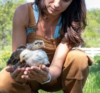 ana roussev with chickens harvard il eden gardens farms